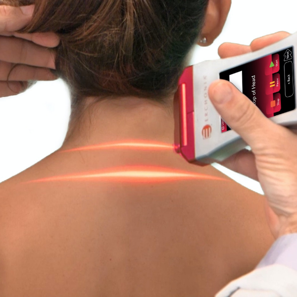 Physical therapist applies laser therapy to the neck of a female patient.
